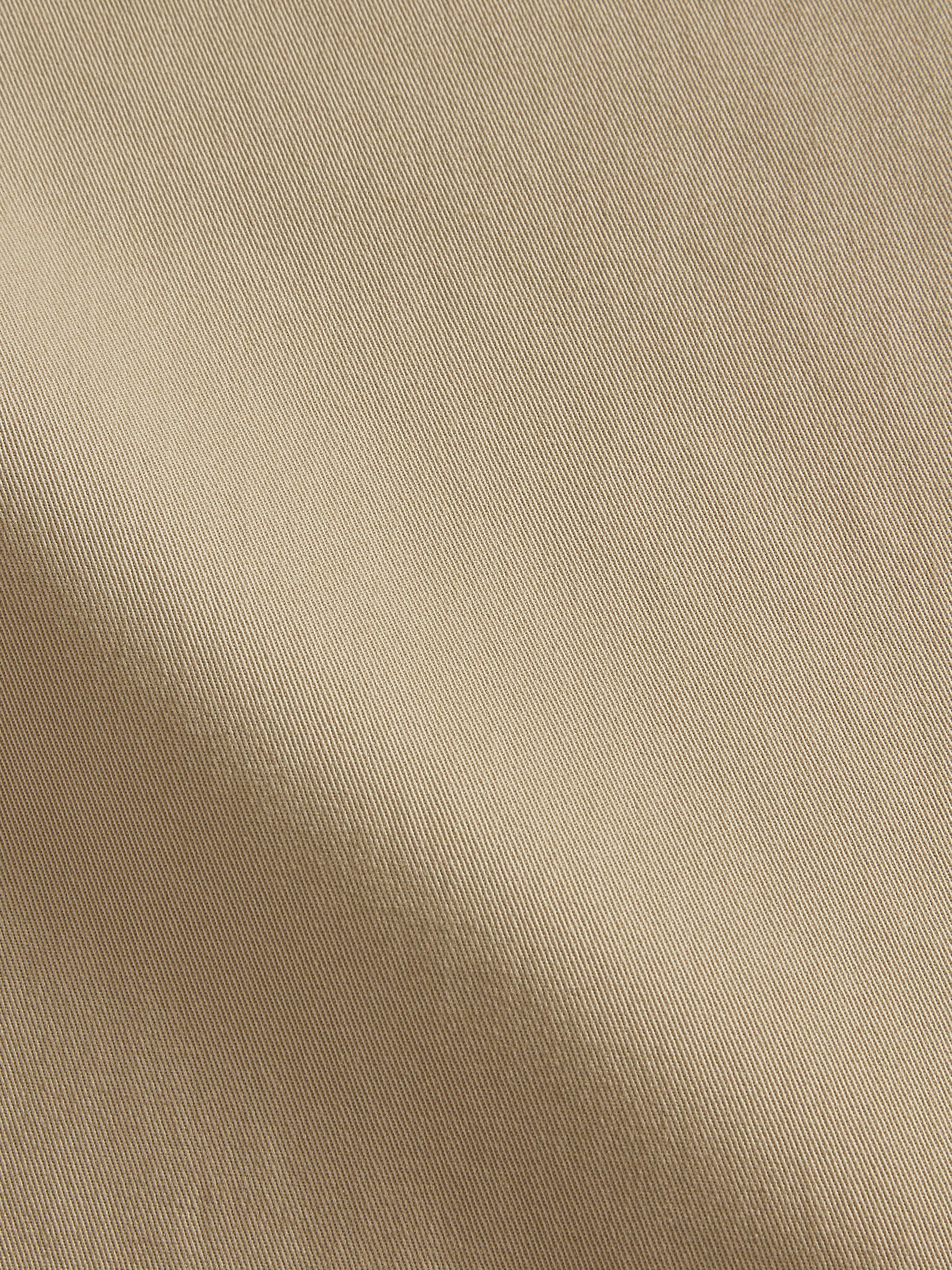 Close-up of beige fabric texture