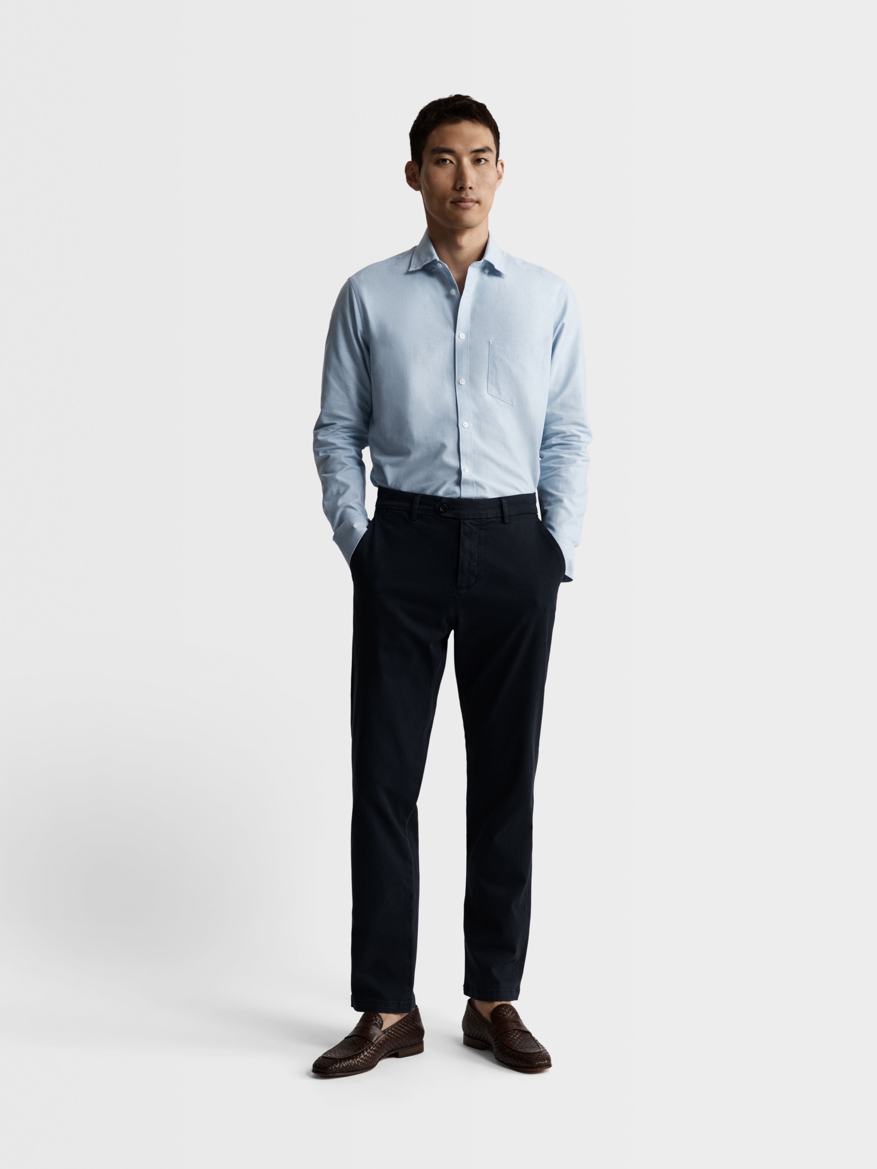 Navy chinos store light blue shirt